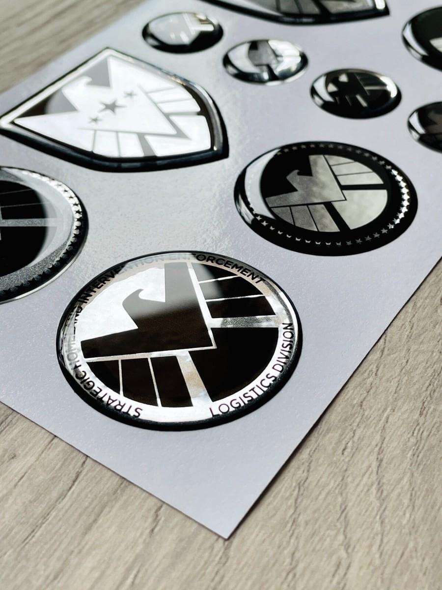 Dome label collection showing various sizes and shapes