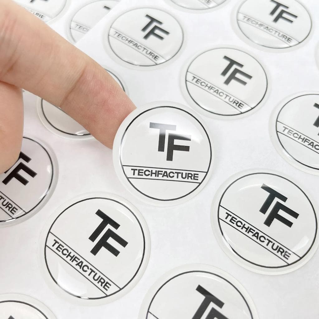 Domed nameplate with scratch-resistant finish